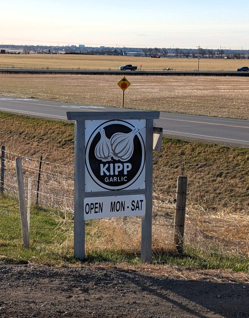 Kipp Garlic farm sign along the highway in Lethbridge Alberta