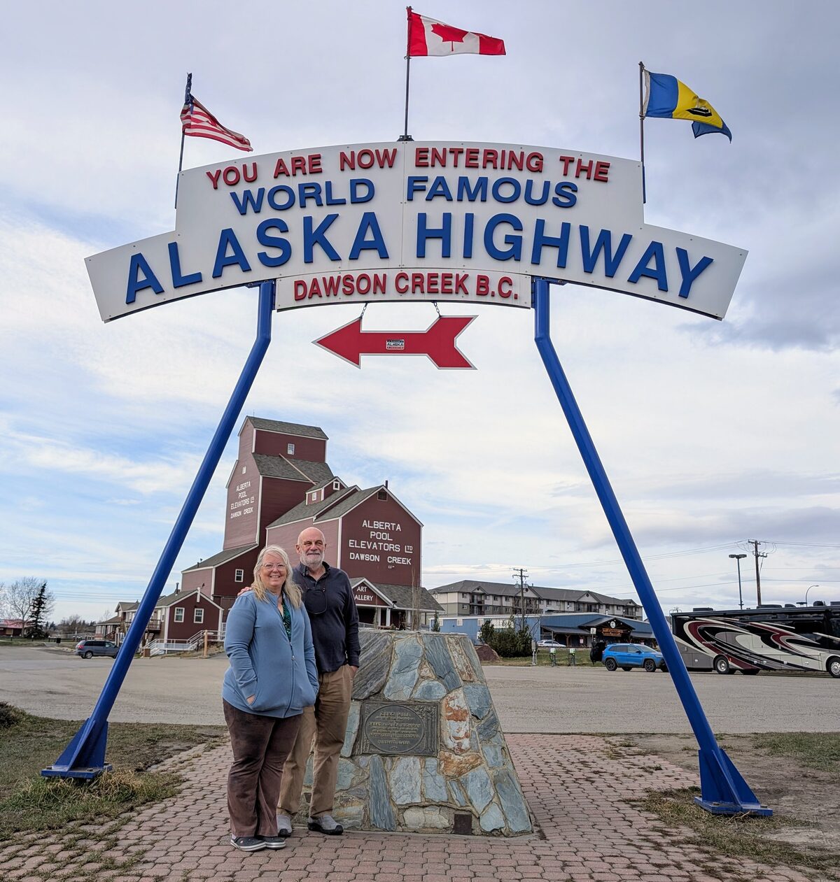 Phyllis and Mike at the Alaska Highway monument in Dawson Creek BC, Mile Zero of the world famous Alaska Highway