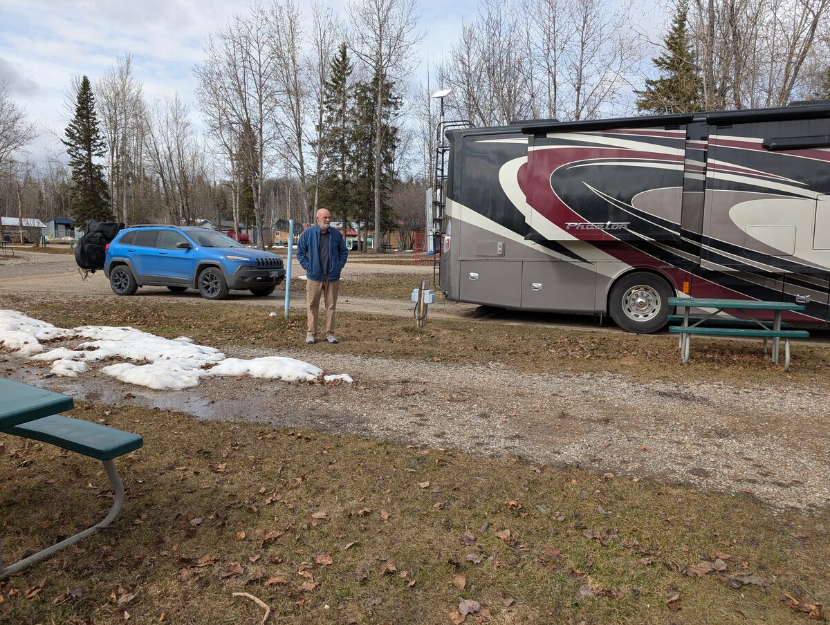 Mike at Fort Nelson campground with snow still on the ground in April