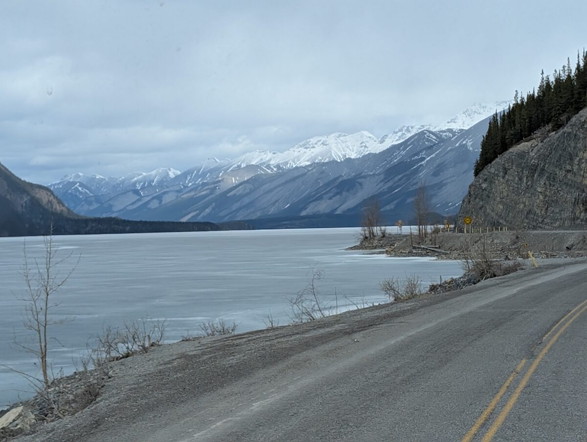 Frozen Muncho Lake alongside the Alaska Highway in British Columbia