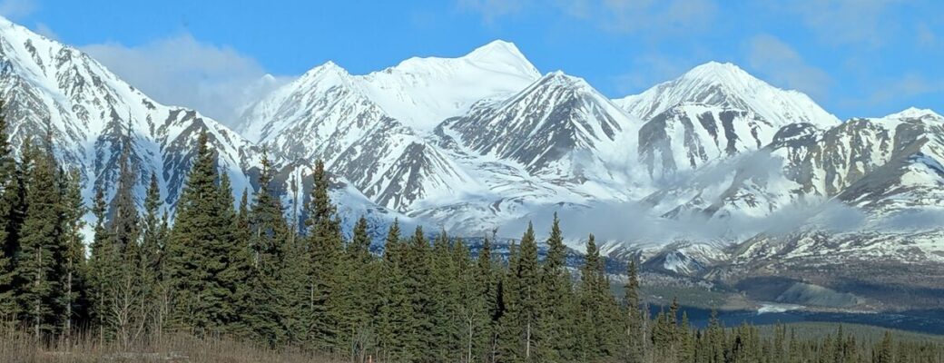 Snow-capped mountains along the Alaska Highway in the Yukon between Haines Junction and Tok