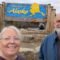 Phyllis and Mike at the Welcome to Alaska sign on the Historic Alaska Highway