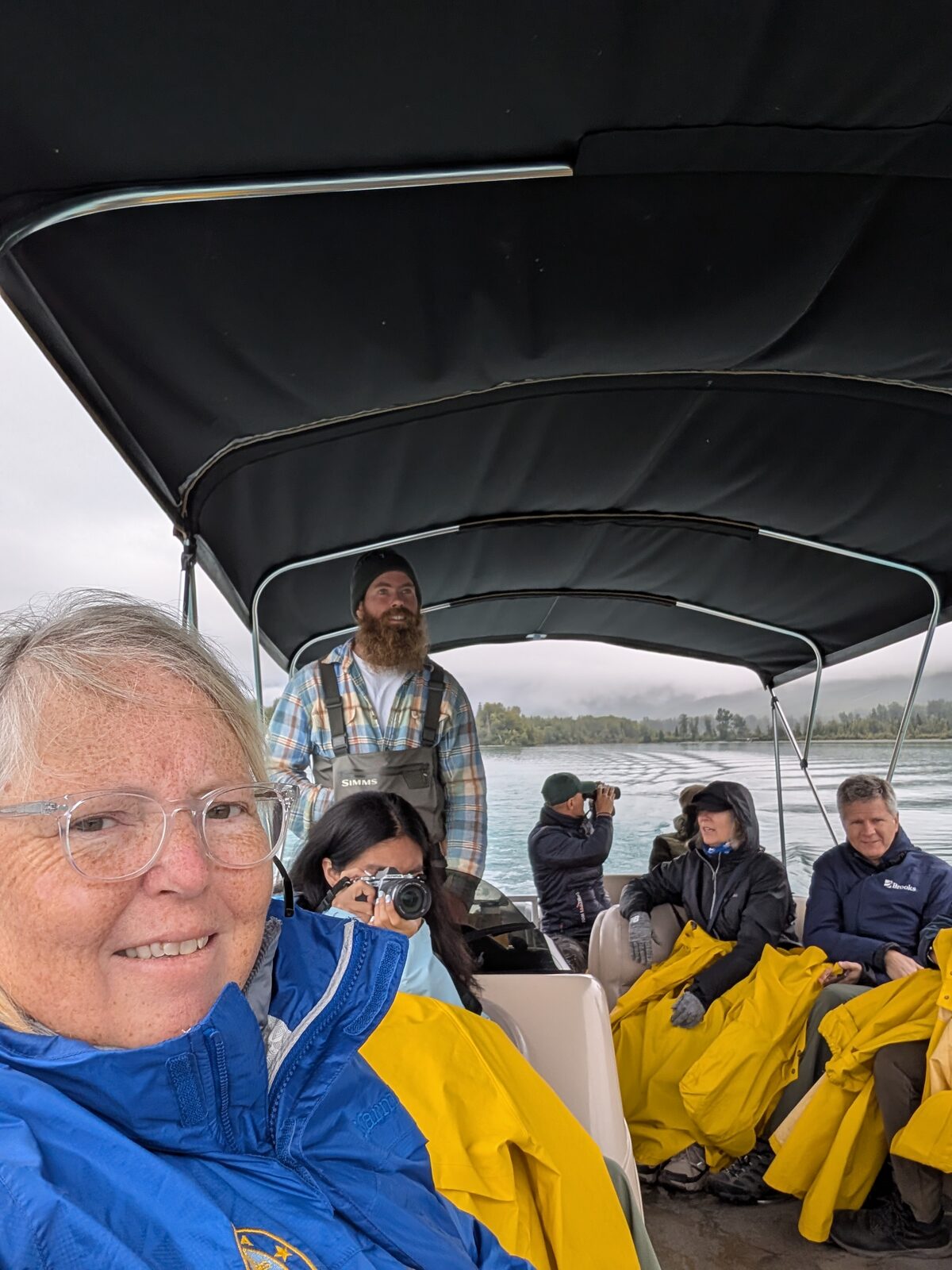 Phyllis selfie on the covered bear viewing boat at Lake Clark National Park, Alaska