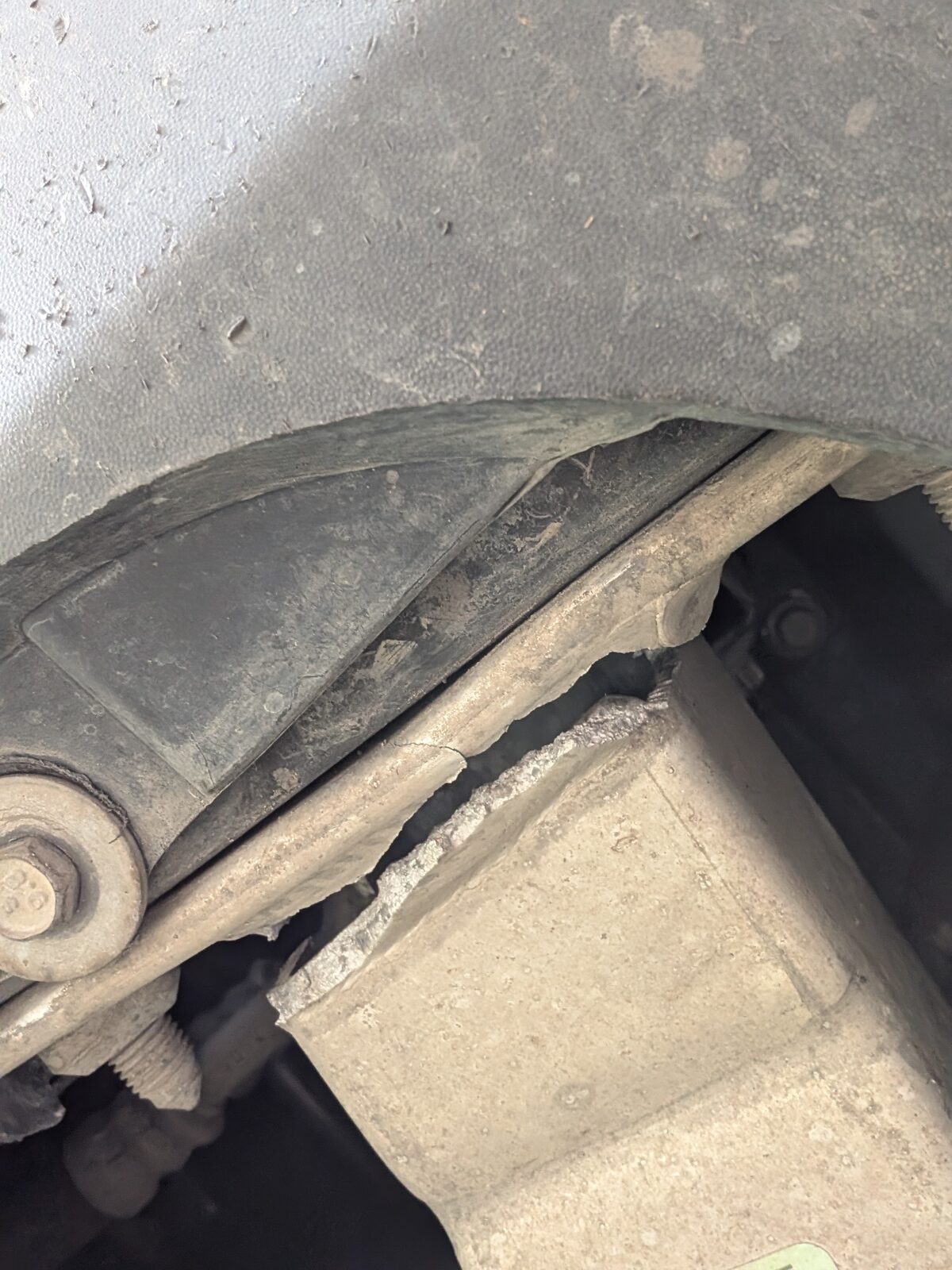 Close-up of cracked Jeep frame weld that failed on the drive home from Alaska