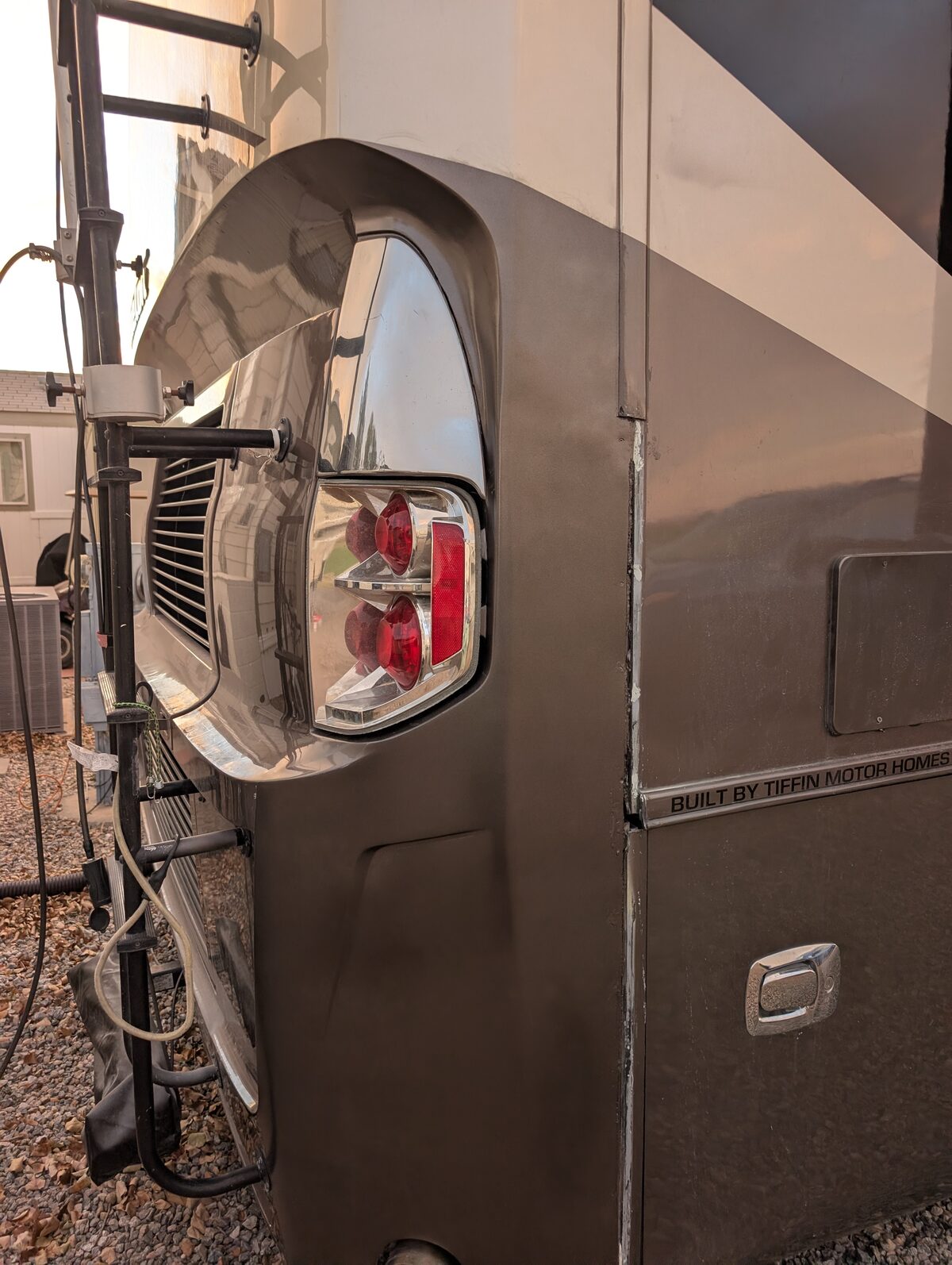 Repaired rear cap of the Tiffin RV after Mike's DIY fiberglass fix in Yuma, Arizona — nearly invisible